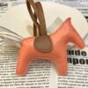 Singapore Kuala Lumpur 187 Factory Lambskin Rose Crevette / Chalk White Rodeo Bag Charms