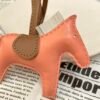 Singapore Kuala Lumpur 187 Factory Lambskin Rose Crevette / Chalk White Rodeo Bag Charms