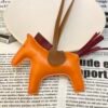 Hong Kong 187 Factory Abricot / Rouge H Lambskin No.49 Rodeo Bag Charms