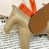 187 Factory Apricot / Gold Lambskin No.42 Rodeo Pegase Charm