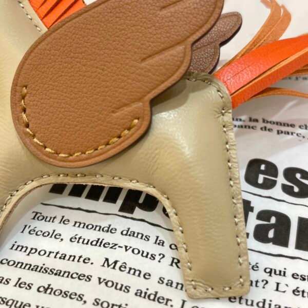 187 Factory Apricot / Gold Lambskin No.42 Rodeo Pegase Charm