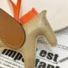 187 Factory Apricot / Gold Lambskin No.42 Rodeo Pegase Charm