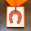 187 Factory Bag Charm Images Feu Orange Swift Leather Paddock Horseshoe Charm