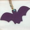 187 Factory Bag Charm Images Bat Charm Noir Epsom / Togo Violet