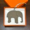 187 Factory Vert Criquet Epsom / Gris Tourterelle Togo Elephant Charm Images