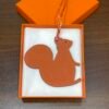 187 Factory Big Squirrel Charm Togo Feu Orange / Epsom Rouge Casaque