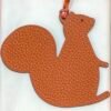 187 Factory Big Squirrel Charm Togo Feu Orange / Epsom Rouge Casaque