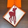 187 Factory Deer Charm Images Epsom Rouge Casaque / Togo Orange Bag Charms