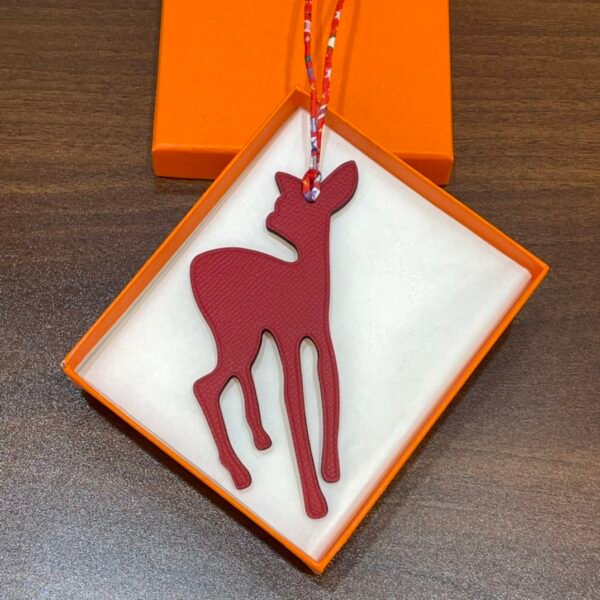 187 Factory Deer Charm Images Epsom Rouge Casaque / Togo Orange Bag Charms