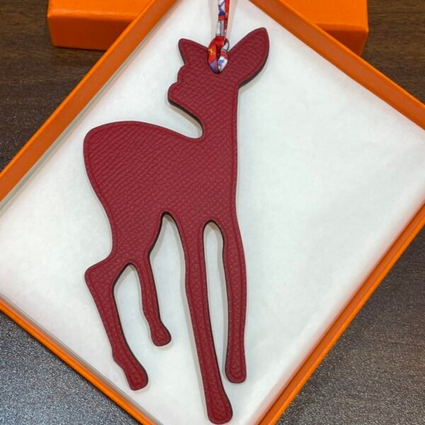187 Factory Deer Charm Images Epsom Rouge Casaque / Togo Orange Bag Charms