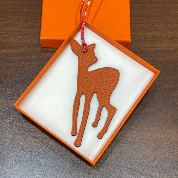 187 Factory Deer Charm Images Epsom Rouge Casaque / Togo Orange Bag Charms