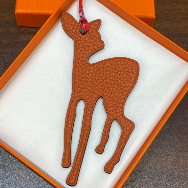 187 Factory Deer Charm Images Epsom Rouge Casaque / Togo Orange Bag Charms
