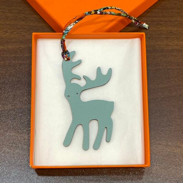187 Factory Orange Togo Leather / Blue Atoll Epsom Leather Wapiti Charms