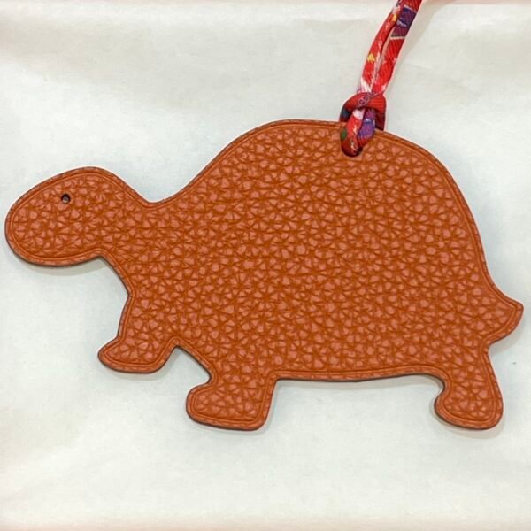 UK London 187 Factory Turtle Charms Rouge Casaque Epsom Leather / Orange Togo Leather