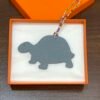 187 Factory Bag Charms Images Turtle Charms Epsom Jaune D’or / Togo Blue Lin