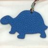 Hong Kong 187 Factory Gold Epsom Leather / Blue Azteque Togo Leather Turtle Charms