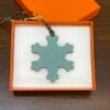 187 Factory Snowflake Charm Images Epsom Leather Blue Attol / Togo Leather Orange