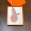 187 Factory Snowman Charm Rose Sakura Togo Leather / Craie Epsom Leather