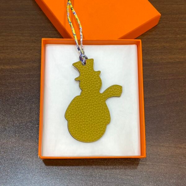 UAE Dubai 187 Factory Snowman Charm Togo Leather Jaune D’or / Epsom Leather Violet