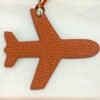 187 Factory Plane Charm Price Orange Togo Leather / Rouge Casaque Epsom Leather