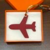 187 Factory Plane Charm Price Orange Togo Leather / Rouge Casaque Epsom Leather