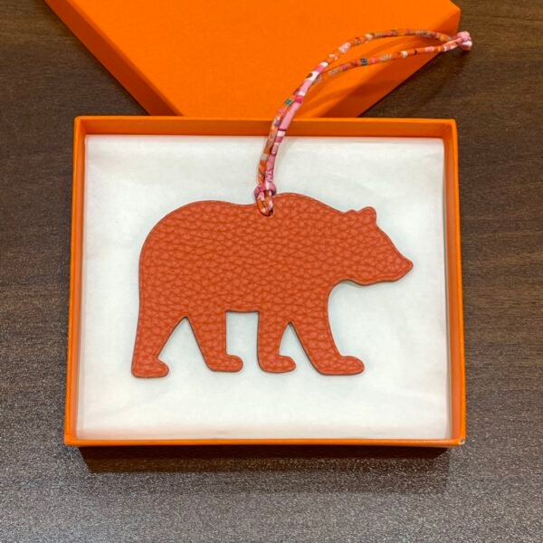 187 Factory Bag Charm Images Togo Feu Orange / Epsom Blue Atoll Brown Bear Charm