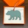 187 Factory Bag Charm Images Togo Feu Orange / Epsom Blue Atoll Brown Bear Charm