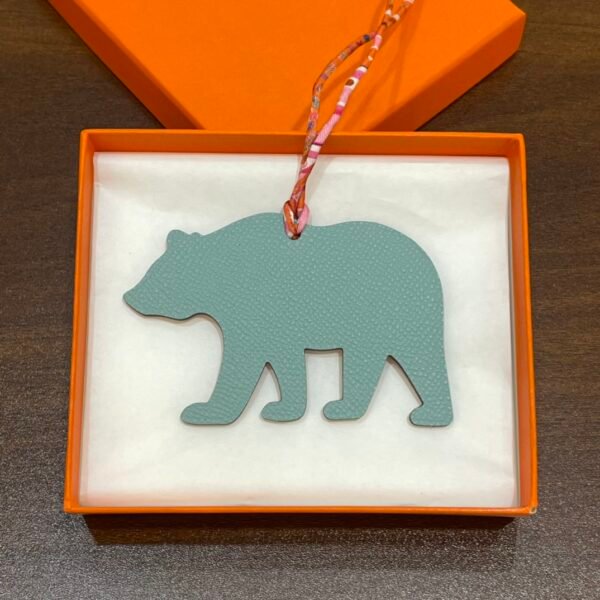 187 Factory Bag Charm Images Togo Feu Orange / Epsom Blue Atoll Brown Bear Charm