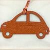 Canada Toronto Epsom Rouge Casaque / Togo Orange Car Charm Price
