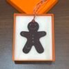 Bag Charm Images Blue Atoll Epsom / Dark Coffee Togo Gingerbread Man Charm