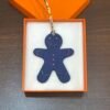Canada Ottawa Gingerbread Man Charm Epsom Lime / Togo Blue Saphir