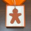 Bag Charm Images Etoupe Epsom / Orange Togo Gingerbread Man Charm