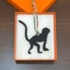 Australia Sydney Guenon Charm Images Togo Leather Noir / Epsom Leather Rouge Casaque