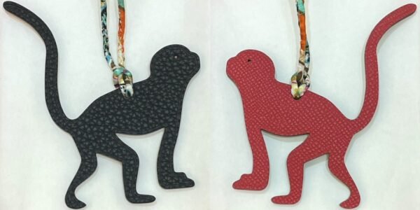 Australia Sydney Guenon Charm Images Togo Leather Noir / Epsom Leather Rouge Casaque