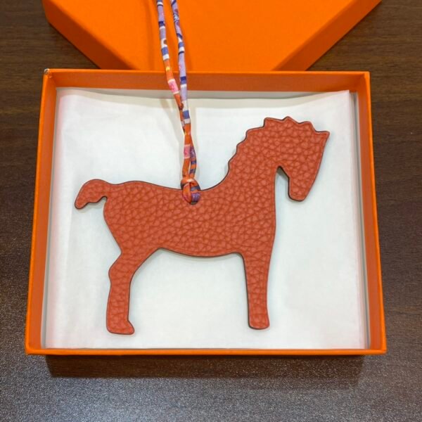 Australia Sydney Orange Togo Leather / Blue Atoll Epsom Leather Pony Charm