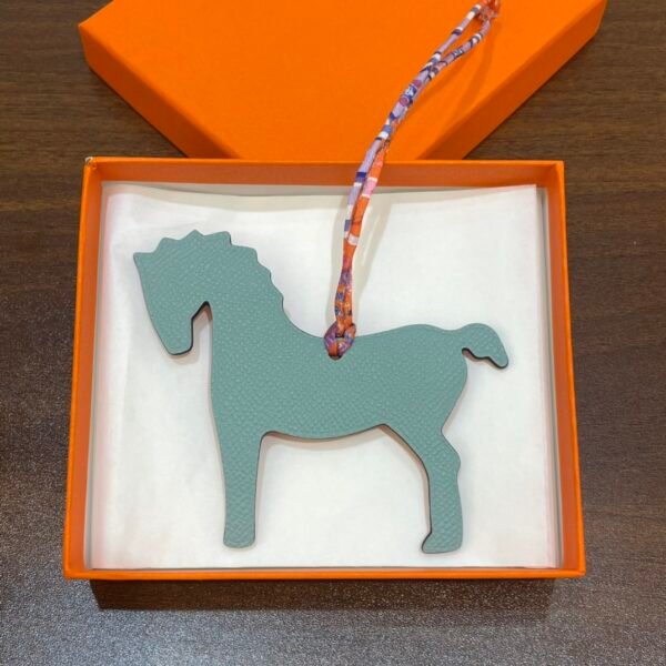 Australia Sydney Orange Togo Leather / Blue Atoll Epsom Leather Pony Charm