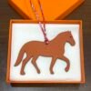 Australia Canberra Stepping Horse Charm Orange Togo / Rouge H Epsom Leather