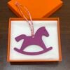 UAD Dubai Trojan Horse Charm Rose Purple Epsom / Rose Sakura Togo Bag Charm
