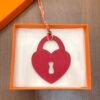 Canada Ottawa 187 Factory Love Lock Charm Rouge Casaque Epsom / Orange Togo Leather