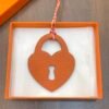 Canada Ottawa 187 Factory Love Lock Charm Rouge Casaque Epsom / Orange Togo Leather