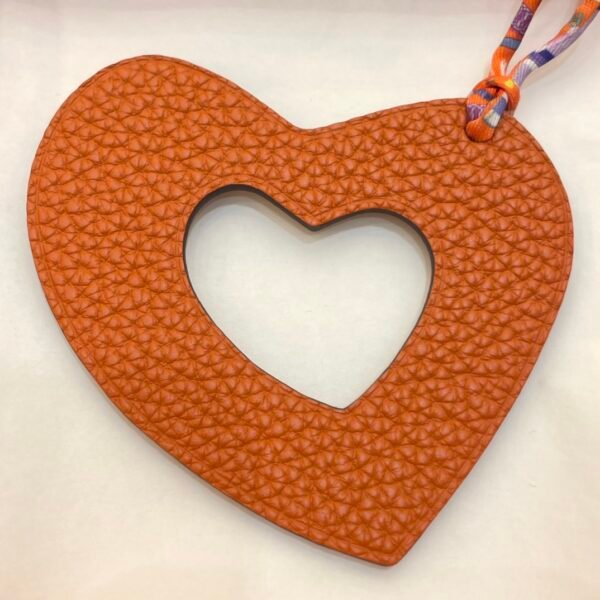 UK London 187 Factory Orange Togo Leather / Rouge Casaque Epsom Hollow Heart Charm