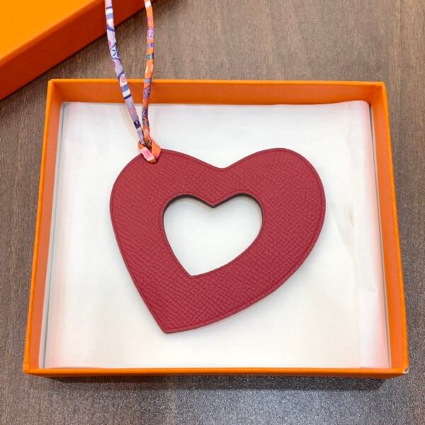 UK London 187 Factory Orange Togo Leather / Rouge Casaque Epsom Hollow Heart Charm