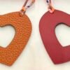 UK London 187 Factory Orange Togo Leather / Rouge Casaque Epsom Hollow Heart Charm