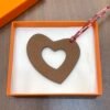 New Arrival 187 Factory Gold Togo Leather / Rouge Casaque Epsom Hollow Heart Charm