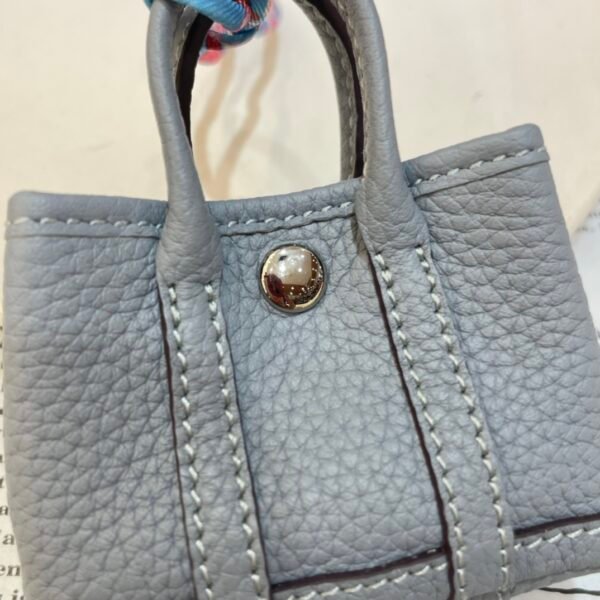 UAE Dubai 187 Factory Garden Party Charm J7 Blue Lin Togo Leather Silver Hardware