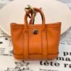 USA New York 187 Factory Orange Togo Leather Garden Party Charm Silver Hardware