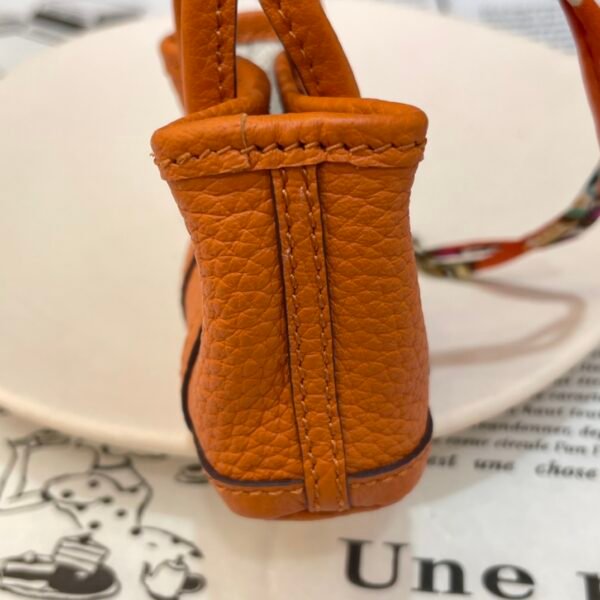 USA New York 187 Factory Orange Togo Leather Garden Party Charm Silver Hardware