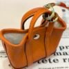 USA New York 187 Factory Orange Togo Leather Garden Party Charm Silver Hardware
